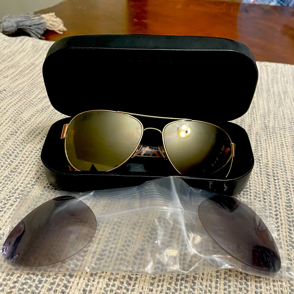 Coach sunglasses! Brand new!! Comes with case and extra lenses.